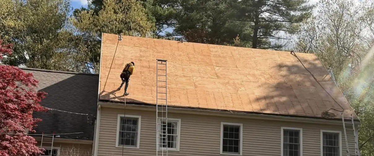 Before: Storm-damaged roof stripped for restoration by a dedicated Roofing Contractor Bismarck ND.